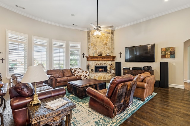 2711 Bauer Ct, Lucas, TX 75002 - living room with ornamental molding, wood finished floors, a fireplace, a ceiling fan, and baseboards