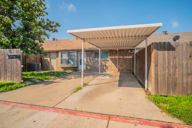 24 W Mountain Creek Dr, Grand Prairie, TX 75052 - view of patio / terrace with central AC and a carport