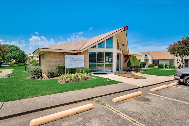 24 W Mountain Creek Dr, Grand Prairie, TX 75052 - view of building exterior featuring uncovered parking