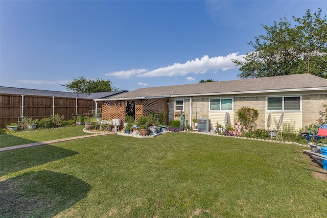 416 S 1st St, Wylie, TX 75098 - rear view of house with cooling unit and brick siding