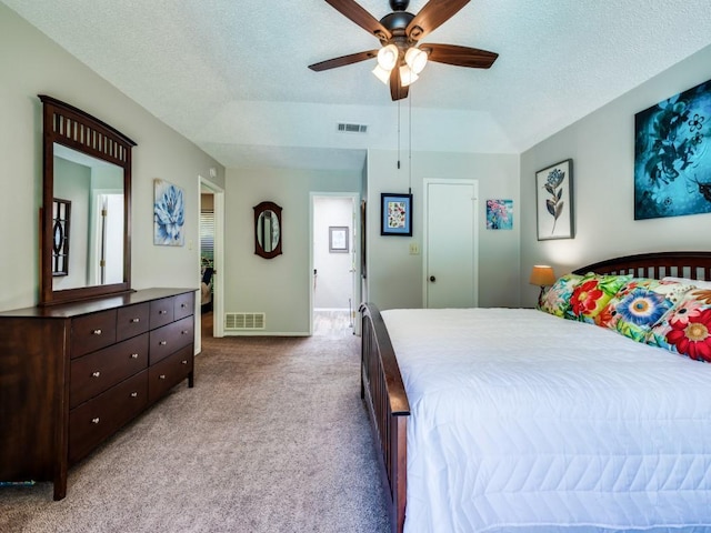 1507 Juniper Ln, Lewisville, TX 75077 - carpeted bedroom with a textured ceiling, a ceiling fan, and baseboards