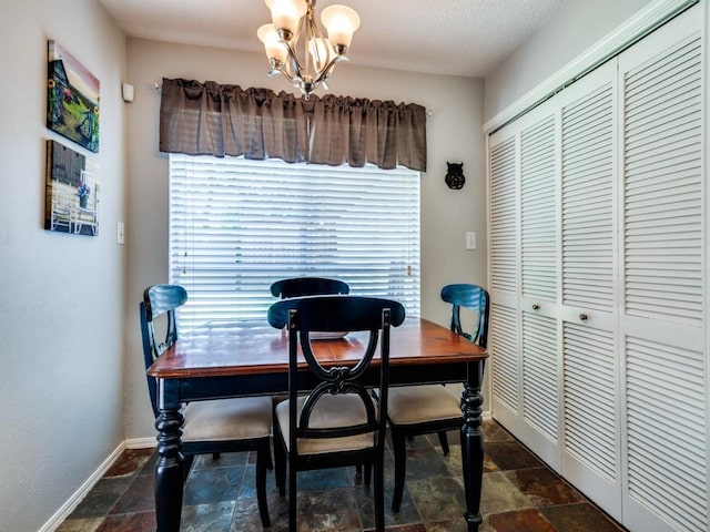 1507 Juniper Ln, Lewisville, TX 75077 - dining room with plenty of natural light, a chandelier, and stone tile floors