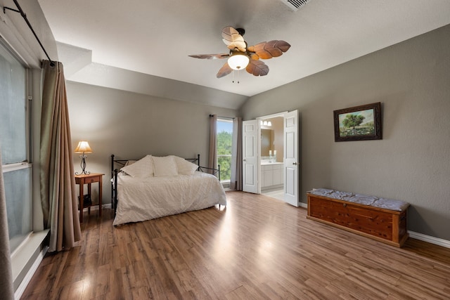 5033 Glenscape Trl, Fort Worth, TX 76137 - bedroom with wood finished floors, lofted ceiling, baseboards, ensuite bathroom, and a ceiling fan