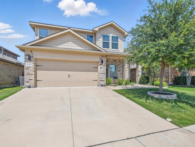 8048 Crimea Ln, Fort Worth, TX 76123 - traditional-style house featuring driveway, a front yard, a garage, brick siding, and central air condition unit