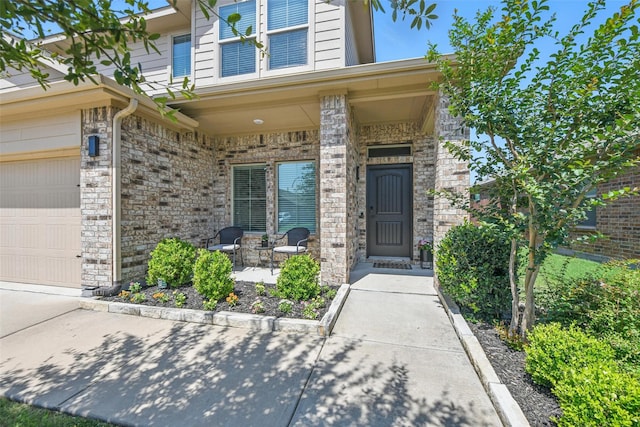 8048 Crimea Ln, Fort Worth, TX 76123 - doorway to property with a garage and a porch