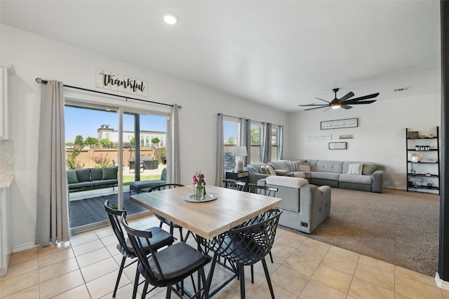 8048 Crimea Ln, Fort Worth, TX 76123 - dining space with light colored carpet, a ceiling fan, and light tile patterned floors