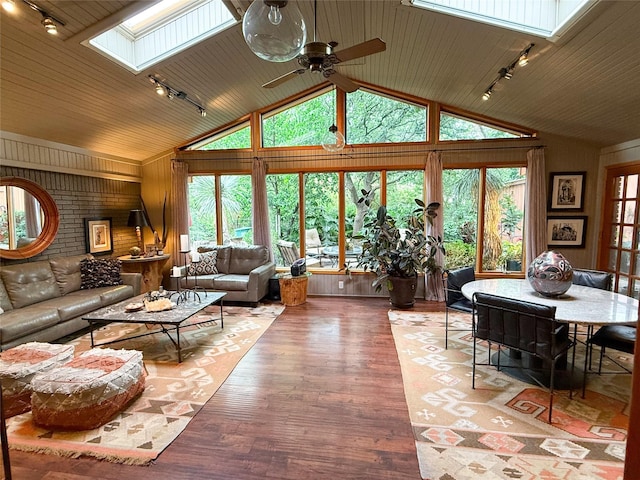 3833 Wilkie Way, Fort Worth, TX 76133 - living room featuring a skylight, rail lighting, healthy amount of natural light, wood ceiling, and ceiling fan