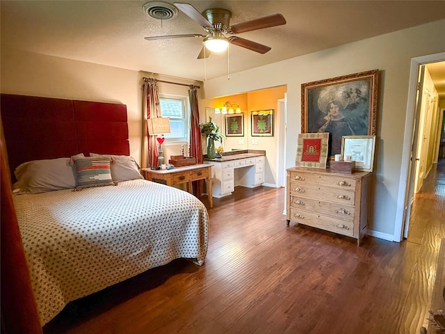 3833 Wilkie Way, Fort Worth, TX 76133 - bedroom with dark wood-style flooring, baseboards, and a ceiling fan
