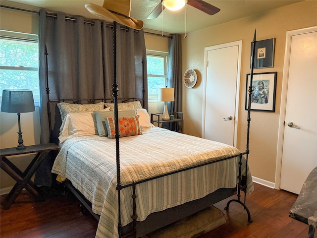 3833 Wilkie Way, Fort Worth, TX 76133 - bedroom with dark wood finished floors, baseboards, and ceiling fan