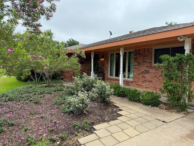3833 Wilkie Way, Fort Worth, TX 76133 - view of side of property with brick siding