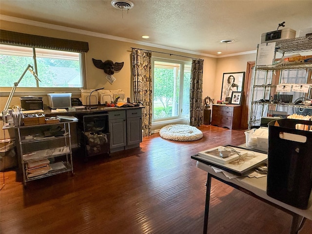3833 Wilkie Way, Fort Worth, TX 76133 - living area with dark wood-type flooring, crown molding, a textured ceiling, and recessed lighting