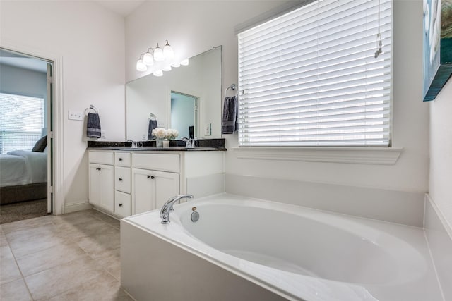 15616 Rockingham St, Frisco, TX 75036 - bathroom featuring vanity, a bath, and plenty of natural light