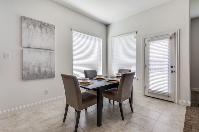 15616 Rockingham St, Frisco, TX 75036 - dining space featuring baseboards and light tile patterned flooring