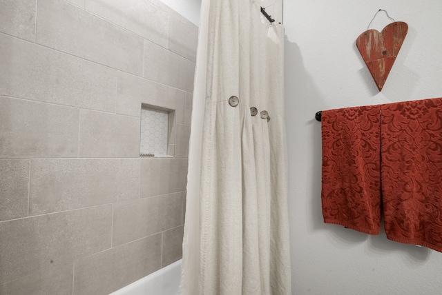 355 Sunset Cv, Bluff Dale, TX 76433 - bathroom featuring shower / tub combo with curtain