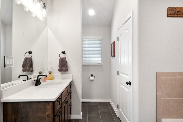 355 Sunset Cv, Bluff Dale, TX 76433 - bathroom featuring vanity, baseboards, and tile patterned flooring