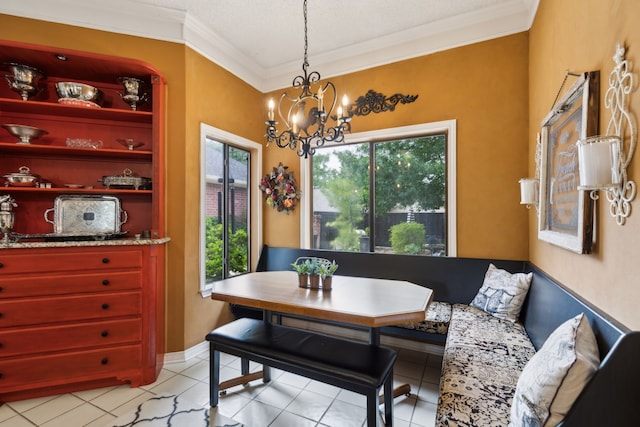 4055 Seabury Dr, Dallas, TX 75287 - dining area with crown molding, a chandelier, and light tile patterned floors