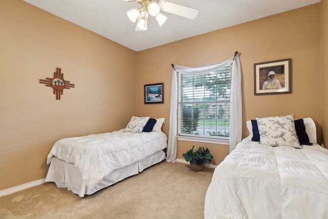 4055 Seabury Dr, Dallas, TX 75287 - bedroom featuring carpet floors, baseboards, and ceiling fan