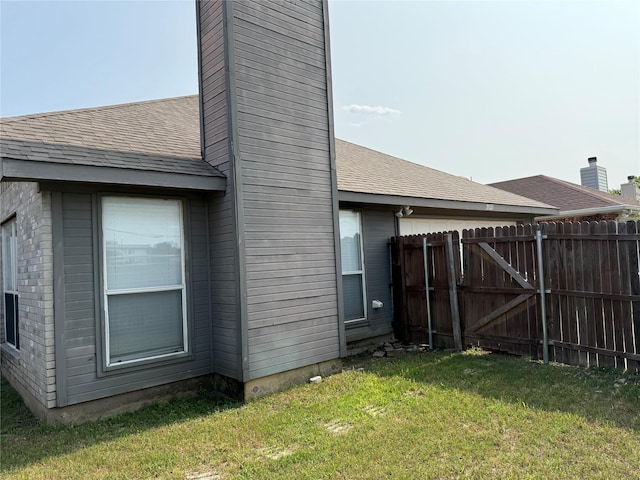2825 Saint Croix Ave, Lancaster, TX 75134 - view of side of home featuring a chimney and a shingled roof