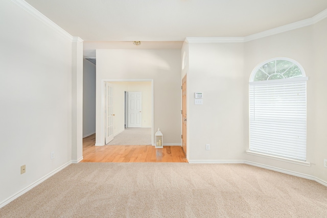 5508 Periwinkle Ln, Mckinney, TX 75070 - spare room featuring light carpet, baseboards, and ornamental molding