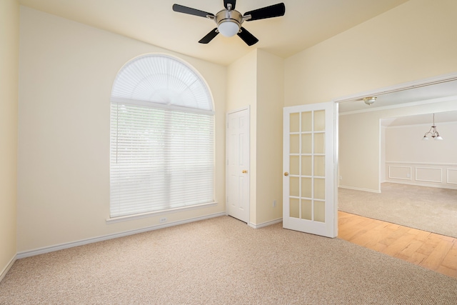 5508 Periwinkle Ln, Mckinney, TX 75070 - carpeted spare room with french doors, ceiling fan, and wood finished floors