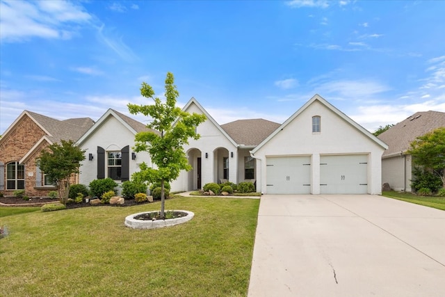 309 Bluffside Trl, Benbrook, TX 76126 - french country home with a front lawn, driveway, an attached garage, and stucco siding