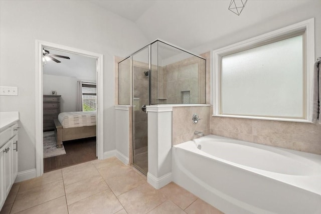 309 Bluffside Trl, Benbrook, TX 76126 - bathroom featuring vanity, a bath, a stall shower, ensuite bath, and tile patterned flooring