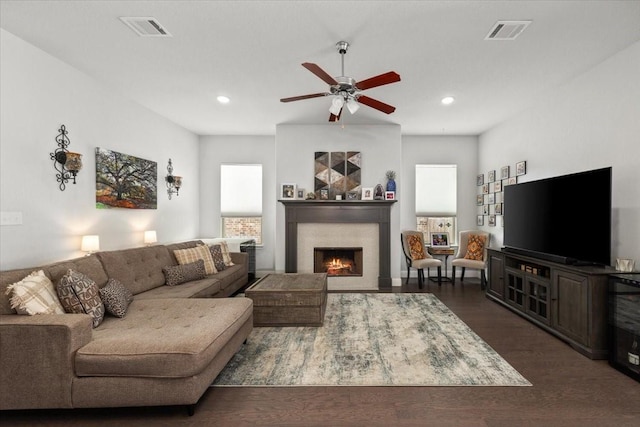309 Bluffside Trl, Benbrook, TX 76126 - living room featuring a ceiling fan, a warm lit fireplace, wood finished floors, and recessed lighting