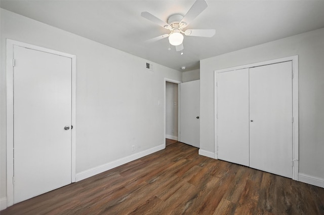 5833 Westhaven Dr, Fort Worth, TX 76132 - unfurnished bedroom with wood finished floors, baseboards, a ceiling fan, and a closet