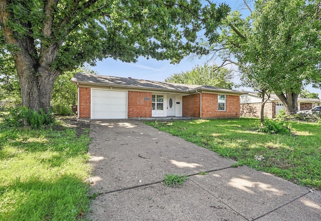 5833 Westhaven Dr, Fort Worth, TX 76132 - single story home with a garage, brick siding, concrete driveway, and a front lawn
