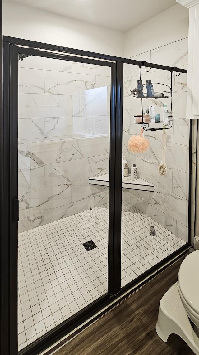 7349 Wildflower Way, Abilene, TX 79602 - bathroom featuring toilet and a marble finish shower