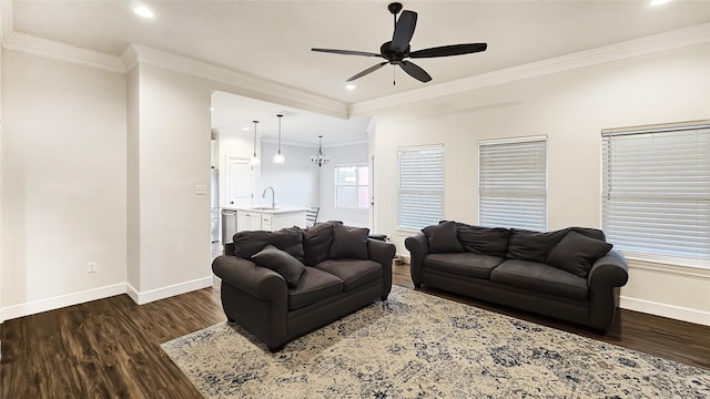 7349 Wildflower Way, Abilene, TX 79602 - living area with baseboards, dark wood finished floors, ceiling fan, recessed lighting, and ornamental molding