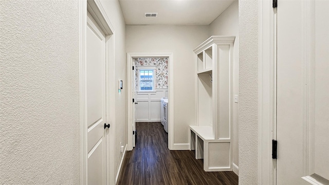 7349 Wildflower Way, Abilene, TX 79602 - mudroom with dark wood finished floors, washing machine and clothes dryer, and baseboards
