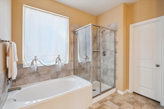 200 Baldwin Dr, Fate, TX 75189 - full bath featuring a garden tub and a shower stall