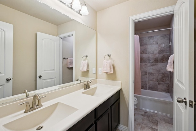 200 Baldwin Dr, Fate, TX 75189 - full bath with double vanity, toilet, and shower / bath combo with shower curtain