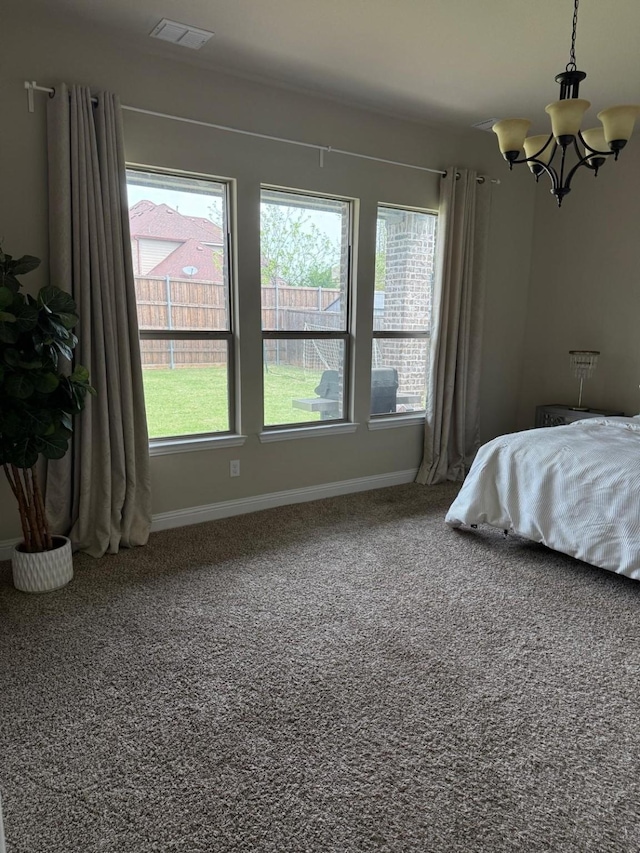 1301 Cold Stream Dr, Wylie, TX 75098 - bedroom featuring a chandelier, carpet flooring, and baseboards