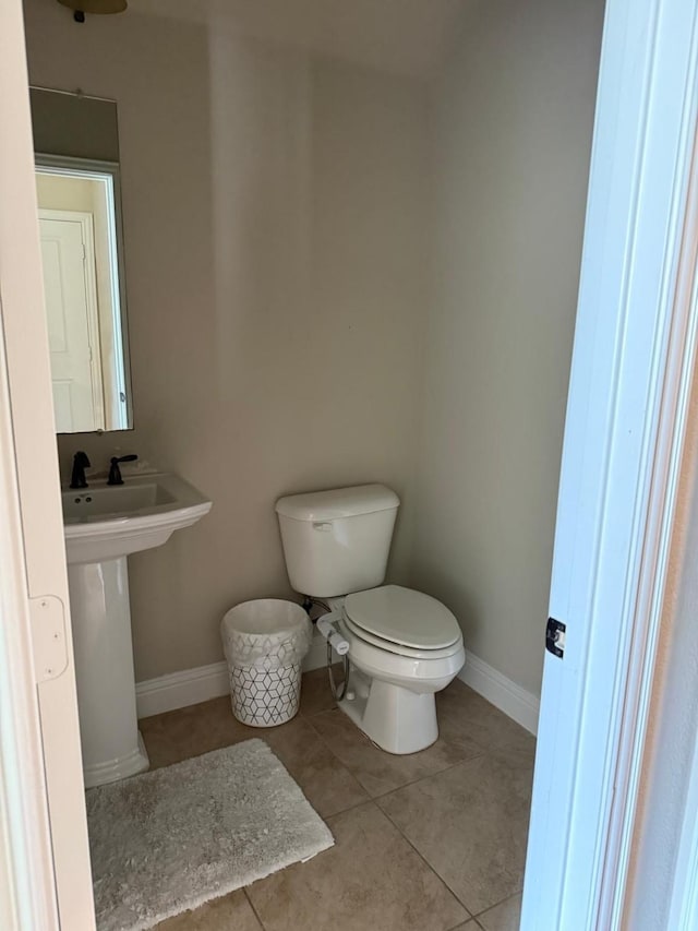 1301 Cold Stream Dr, Wylie, TX 75098 - bathroom with toilet, baseboards, and tile patterned flooring