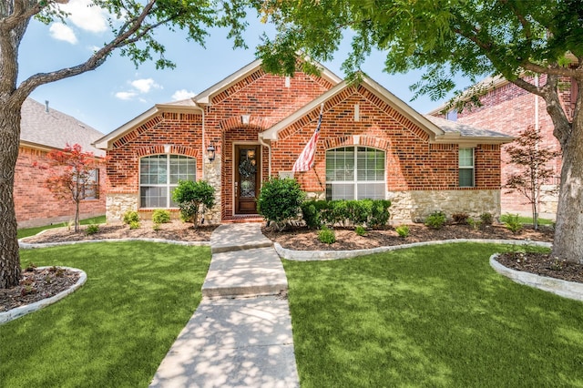3526 Washington Dr, Frisco, TX 75034 - traditional home with a front lawn, brick siding, and stone siding