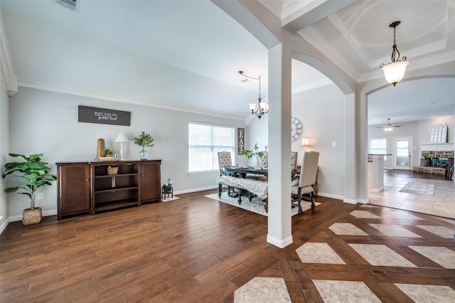 3526 Washington Dr, Frisco, TX 75034 - dining space with arched walkways, plenty of natural light, crown molding, ceiling fan, and baseboards
