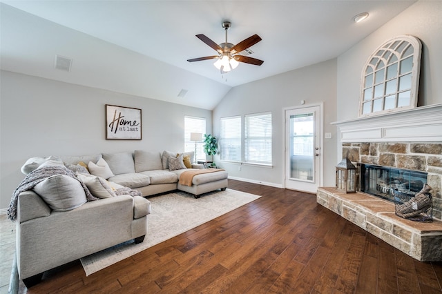 3526 Washington Dr, Frisco, TX 75034 - living room with lofted ceiling, dark wood finished floors, ceiling fan, baseboards, and a fireplace
