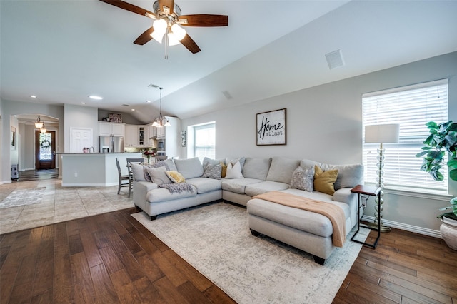 3526 Washington Dr, Frisco, TX 75034 - living room featuring a ceiling fan, light wood-style floors, lofted ceiling, baseboards, and recessed lighting