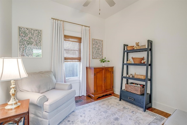 2913 Willing Ave, Fort Worth, TX 76110 - sitting room with wood finished floors, ceiling fan, and baseboards