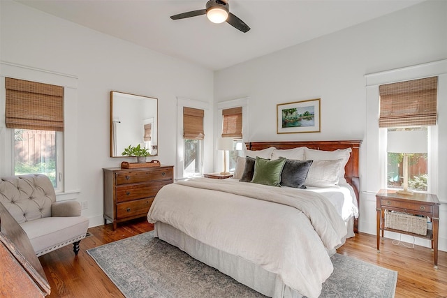 2913 Willing Ave, Fort Worth, TX 76110 - bedroom featuring multiple windows, wood finished floors, and a ceiling fan