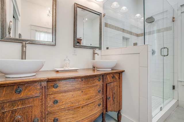 2913 Willing Ave, Fort Worth, TX 76110 - bathroom featuring a stall shower and double vanity