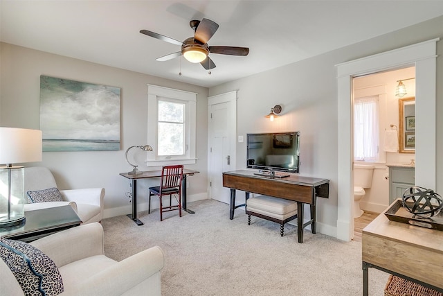 2913 Willing Ave, Fort Worth, TX 76110 - living area featuring ceiling fan, baseboards, and light colored carpet