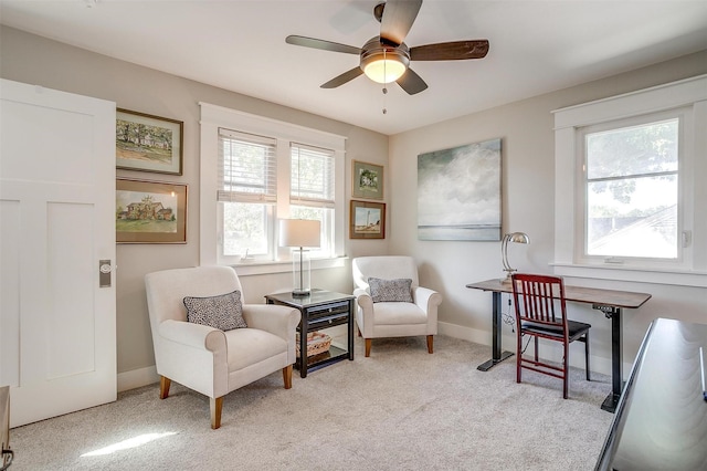 2913 Willing Ave, Fort Worth, TX 76110 - sitting room with healthy amount of natural light, ceiling fan, carpet flooring, and baseboards