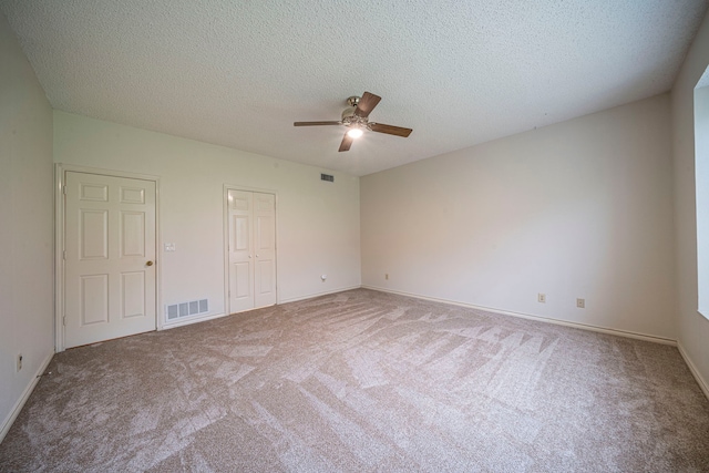 4404 Bentley Dr, Plano, TX 75093 - spare room featuring ceiling fan, carpet floors, a textured ceiling, and baseboards