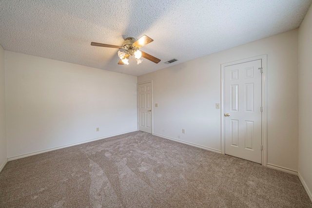 4404 Bentley Dr, Plano, TX 75093 - unfurnished bedroom featuring carpet flooring, a textured ceiling, ceiling fan, and baseboards