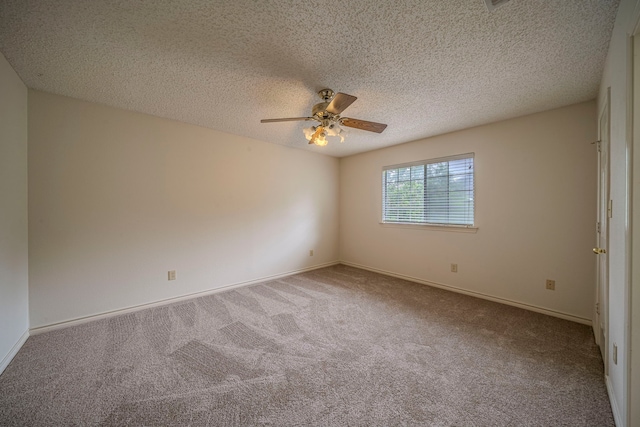 4404 Bentley Dr, Plano, TX 75093 - carpeted spare room featuring ceiling fan, a textured ceiling, and baseboards