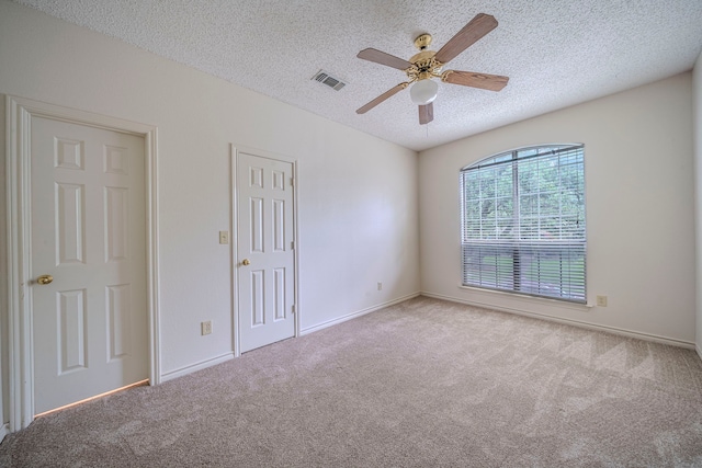 4404 Bentley Dr, Plano, TX 75093 - spare room featuring carpet, a textured ceiling, ceiling fan, and baseboards
