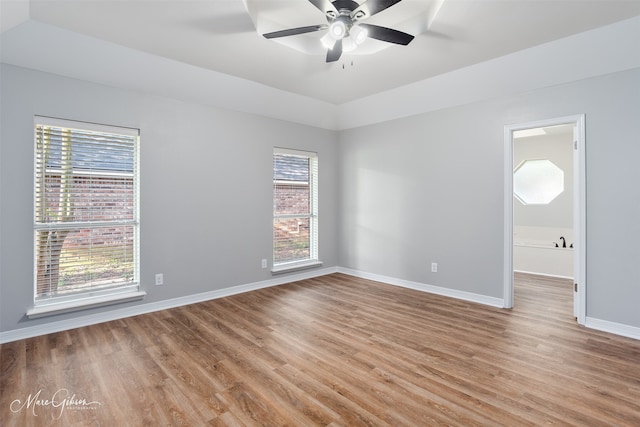 9756 Amblewood Ln, Shreveport, LA 71118 - empty room featuring light wood-style flooring, ceiling fan, baseboards, and lofted ceiling
